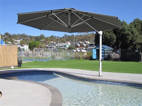 Block Out The Sun With Cantilever Umbrella In Australia Pool Shade